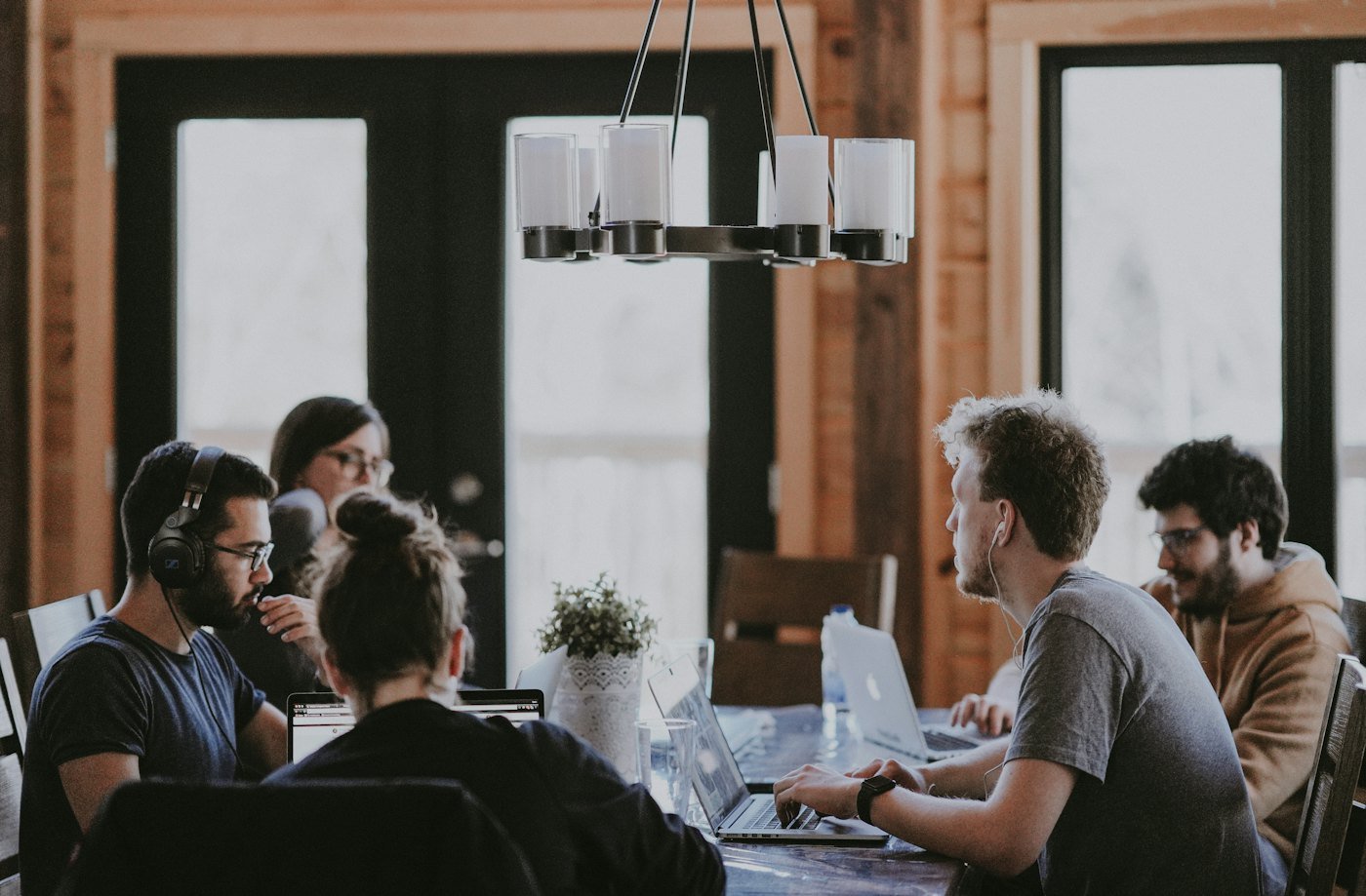 A group of professionals collaborating around a table